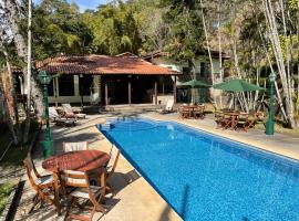 Pousada Cozy House, bed and breakfast en Itaipava