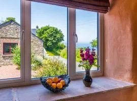 Polrunny Farm sea view Blueberry Cottage with log burner