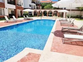 Coral Village Oasis Tropical Deluxe Condo-Walk to the Beach and Popular Attractions!!