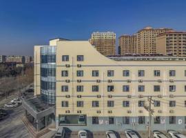 Magnotel Binhai Bohai Five Road Hotel, 3-stjernet hotel i Binzhou