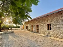 Kostela Stone House