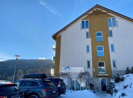 Apartament Czarna Góra Livigno, property with onsen in Sienna