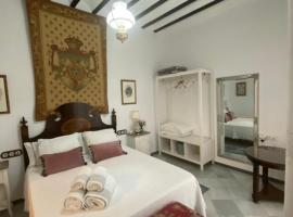 Lujosa suite privada en casa del S XIX, séjour chez l'habitant à Sanlúcar de Barrameda