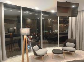 Onkel Inn Apart Suites, hotel in zona Irpavi Teleferico Station, La Paz