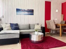 Strandliebe in Scharbeutz, stilvolle Ferienwohnung, 150m zum Strand! Sonnenbalkon, ruhig gelegen, kostenfreier Parkplatz, Fahrstuhl