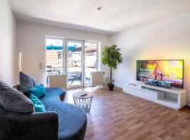 Stylische 2-Zimmer Wohnung - Balkon - Parkplatz - Smart TV - Arbeitsplatz, hotell i Friedberg