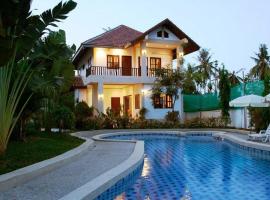 茉莉花之家度假村，位于曾蒙海滩的酒店