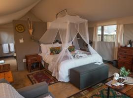 Umkumbe Bush Lodge - Luxury Tented Camp, отель в городе Скукуза