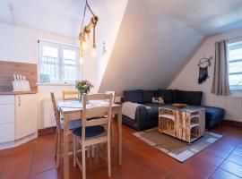 Feriendorf Rugana - Komfortplus Ferienwohnung mit 1 Schlafzimmer B12, ξενοδοχείο σε Dranske