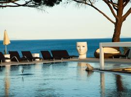 Resort Capo Bianco, alloggio vicino alla spiaggia a Porto Azzurro