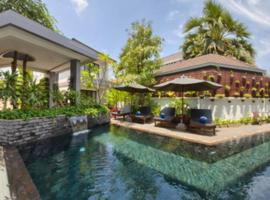Siem Reap Tevi Residence，Phumĭ Réach Born的附設泳池的飯店