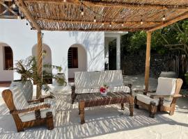 Meliks, bed and breakfast en Jambiani