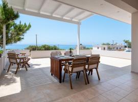 Sea view Pine house – dom wakacyjny w mieście Makry Gialos