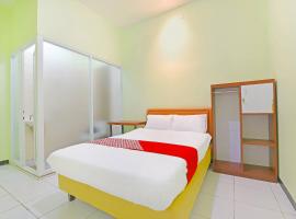 OYO 91351 87 Guest House, hotel di Balian