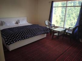 Kedar hill resort، فندق في Trijugi Nārāyan