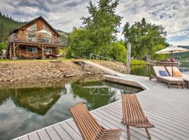 Waterfront Cabin with 2 Boat Docks and Mtn Views!, hotel in Saint Maries
