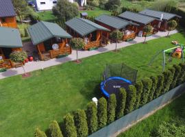 Domki letniskowe ZŁOTE PIASKI Ustka, hotel en Ustka