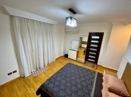 Golden house - men only, serviced apartment in 6th Of October