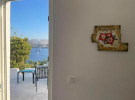 Sweet home with two beds -one single room- with beautiful view!, hotel i Agia Marina