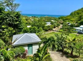 Le Surf Lodge, chambre avec vue mer dans un écrin de verdure