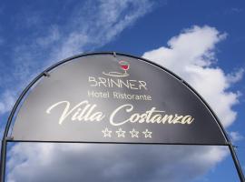 Hotel Villa Costanza，旁蒂紐爾的有停車位的飯店