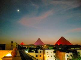 Hassan Pyramids Hotel, отель в Каире