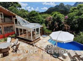 Casa Maria Comprida Araras, serviço incluído, 5 quartos, piscina e área gourmet, vacation home in Petrópolis