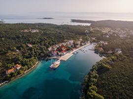 Apartments by the sea Molat - 18433, hotel en Molat