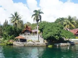 Romlan, guest house in Tuktuk Siadong