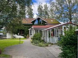 Árbakki Farmhouse Lodge、レイクホルトのバケーションレンタル