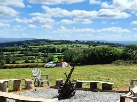 Summit Camping Kit Hill Stunning views Grass pitch or upgrade to Bell tent hire