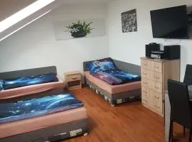 pokoj s kuchynì pro tři