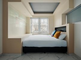 Cozy M Hotel, отель в Сиднее, в районе Вуллумулу