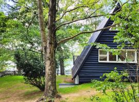 Winnica Niebò - domek z balią nad jeziorem, hotel en Mezowo