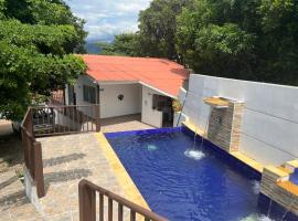 Finca acogedora en Villeta con piscina privada, hotel en Villeta