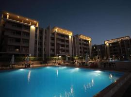 شاليه غرفة وريسبشن جراند هيلز, hotel v destinaci Dawwār ‘Abd Allāh