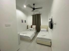 dsinggahPCB Guest House، بيت عطلات شاطئي في كوتا بْهارو