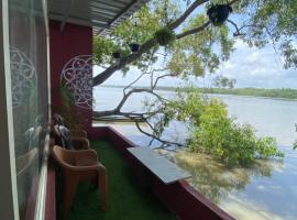 Beach dormitory, hotel di Udupi