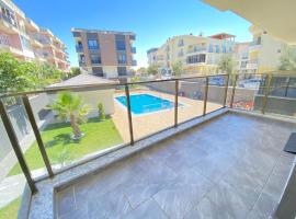 Brand new 2 bedroom apartment with pool Didim good location – hotel z parkingiem w mieście Yenihisar