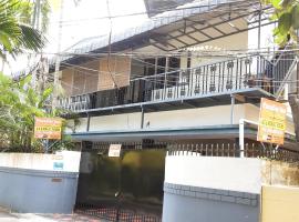 Paradise Inn Guest House, hostal o pensión en Alappuzha