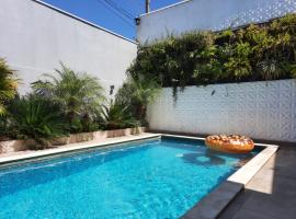 Bela Casa Piscina Aquecimento Solar em Americana-SP, хотел в Американа