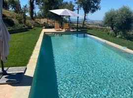 PODERE TORRICELLE 69B Pancole Gr, seaview infinity pool, jacuzzi, sauna, exclusive villa for 4 and extra independent suite for 2 in a separated section of main villa with private ensuite bathroom, kitchenette and garden dining area
