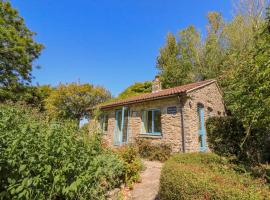 Fossil And The Cross Cottage, casa vacacional en Swyre