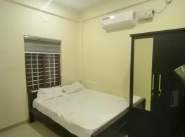 Queens Residency, hotel com estacionamento em Thrissur