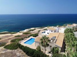 Seafront 5 Bedroom Villa Paradise in Sea Caves, hotel in Peyia