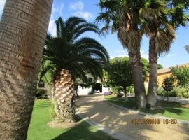 les palmiers, quarto em acomodação popular em Vias