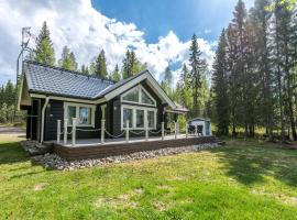 Lähderinne - Beachfront 2 bedroom log cabin, private beach & sauna, hotel que acepta mascotas en Puolanka