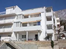 Apartments with a parking space Nemira, Omis - 6070