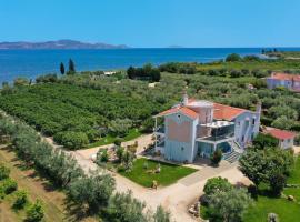 Beachfront Villa Samantha's Paradise, αγροικία στο Κιβέρι