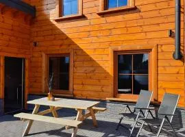 Chalet Momage dichtbij Skiliften, Skiverhuur en Bikepark!